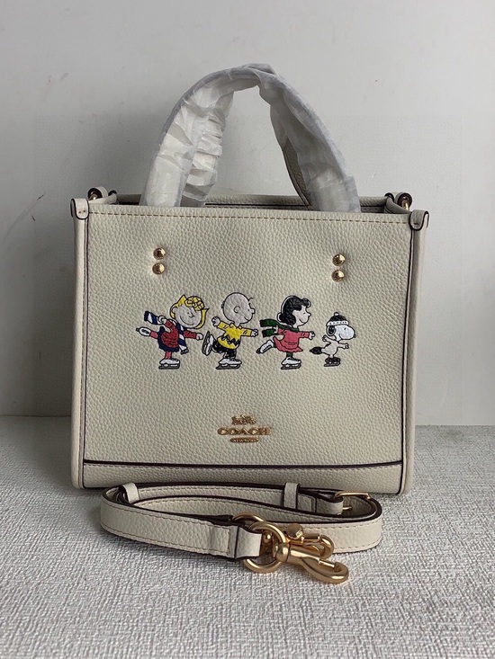 Coach Handbags - Coach Cream Satchel with Peanuts Character Print